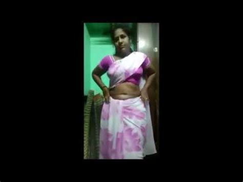 tamil aunty hot saree|Tamil Mom dress change captured his neighbours son